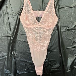 Baby pink see through stretch lingerie from Savage X Fenty.